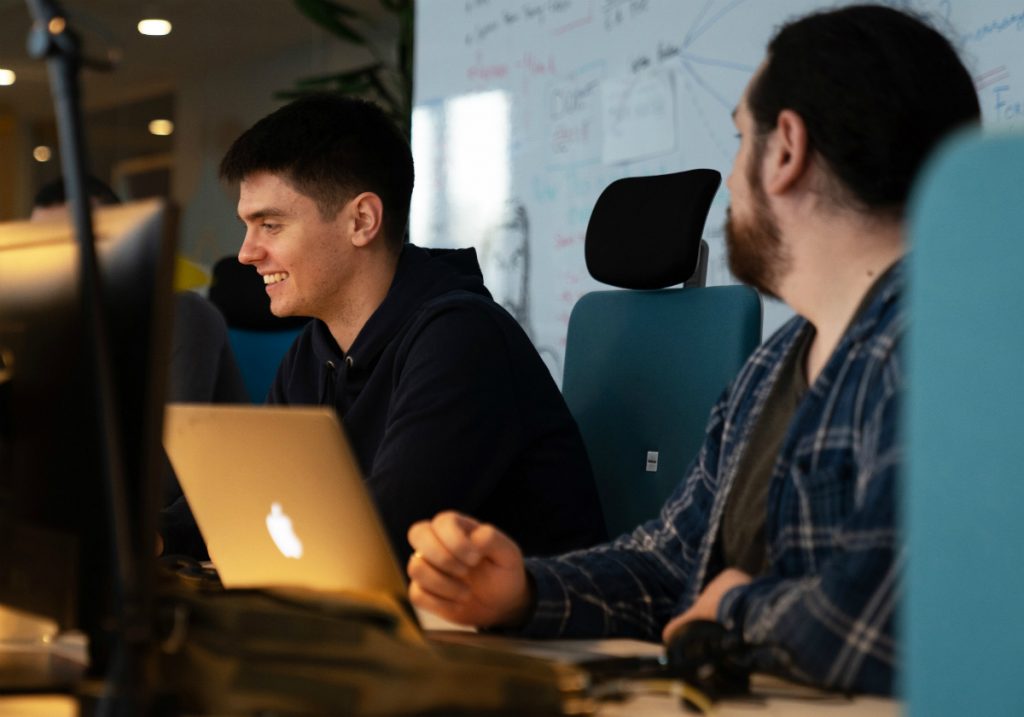 Boys laughing at work