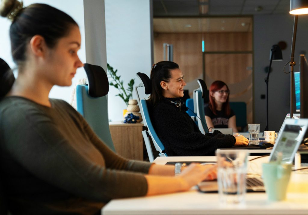 Girls chatting and working